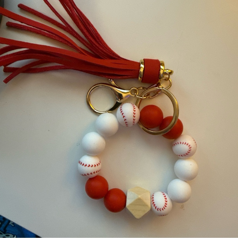 Red and White Beaded Bracelet with Gold Accents